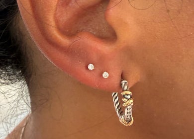 Close-up of diamond earrings from Pierce’T in Curaçao, Curaçao, CW.