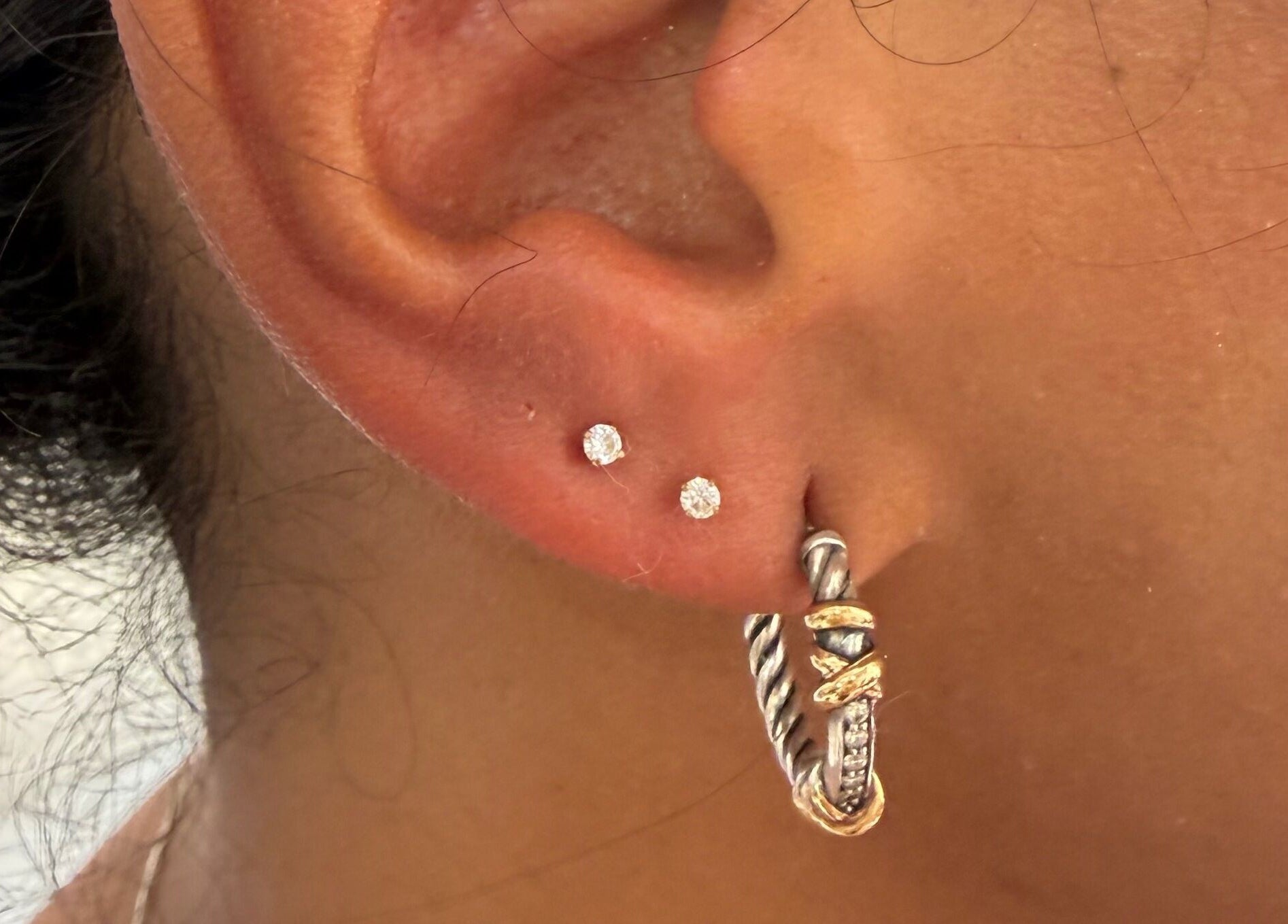 Close-up of diamond earrings from Pierce’T in Curaçao, Curaçao, CW.