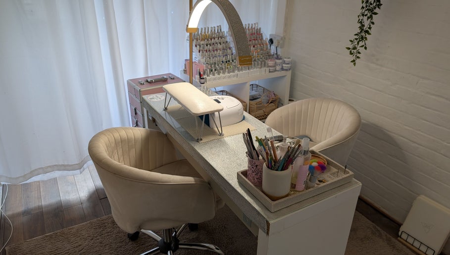 Stylish manicure station at Luxe Beauty by Rosie, Lowestoft, England, GB with tools and comfy chairs.