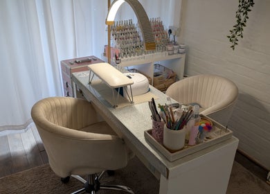 Stylish manicure station at Luxe Beauty by Rosie, Lowestoft, England, GB with tools and comfy chairs.