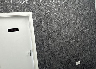 Stylish door with artistic wallpaper at Beautesuite By Erin, Dukinfield, England, GB.