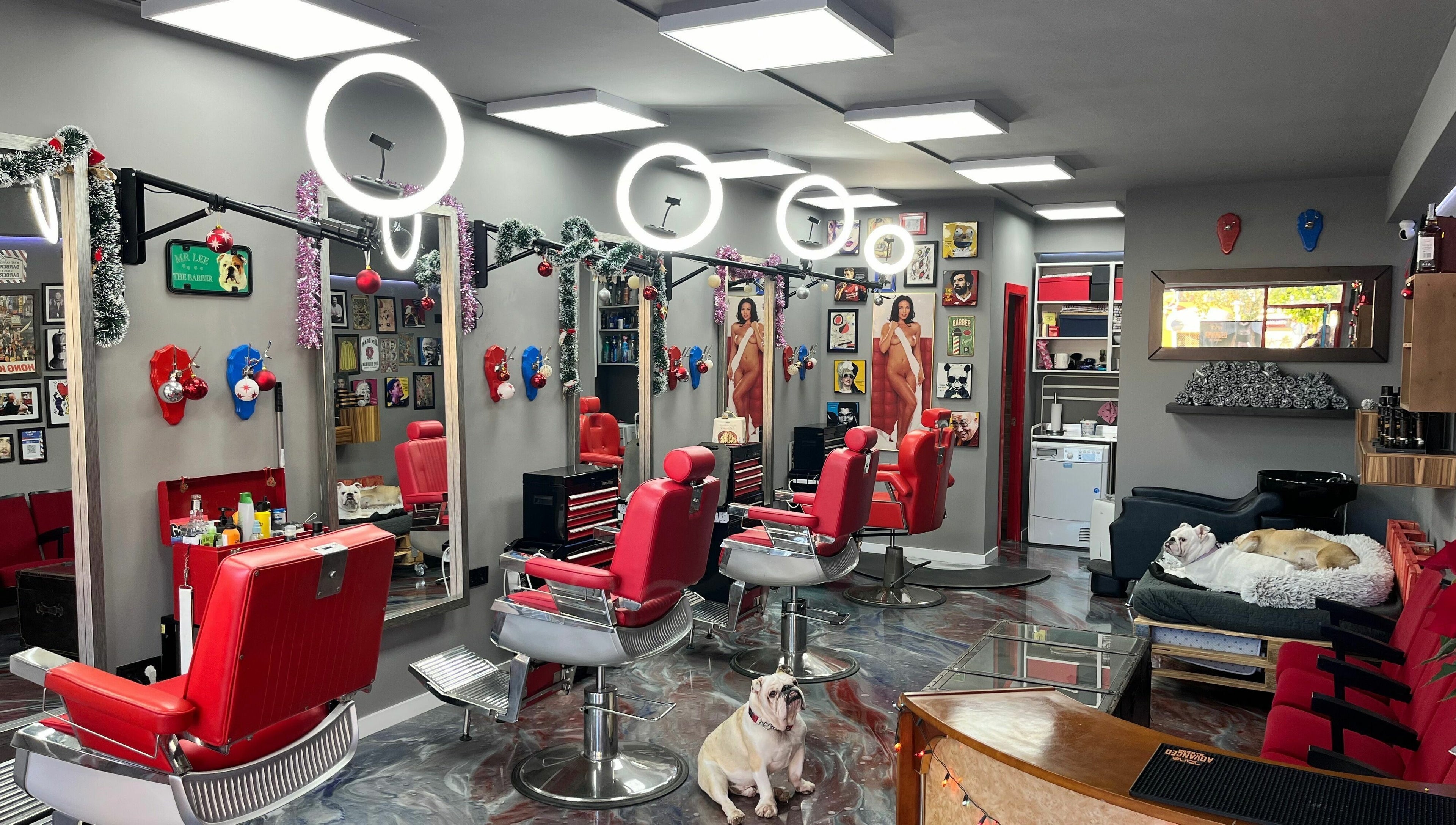 Inside Mr. Lee's Barbershop, Magaluf, Illes Balears, ES. Stylish chairs and decor.