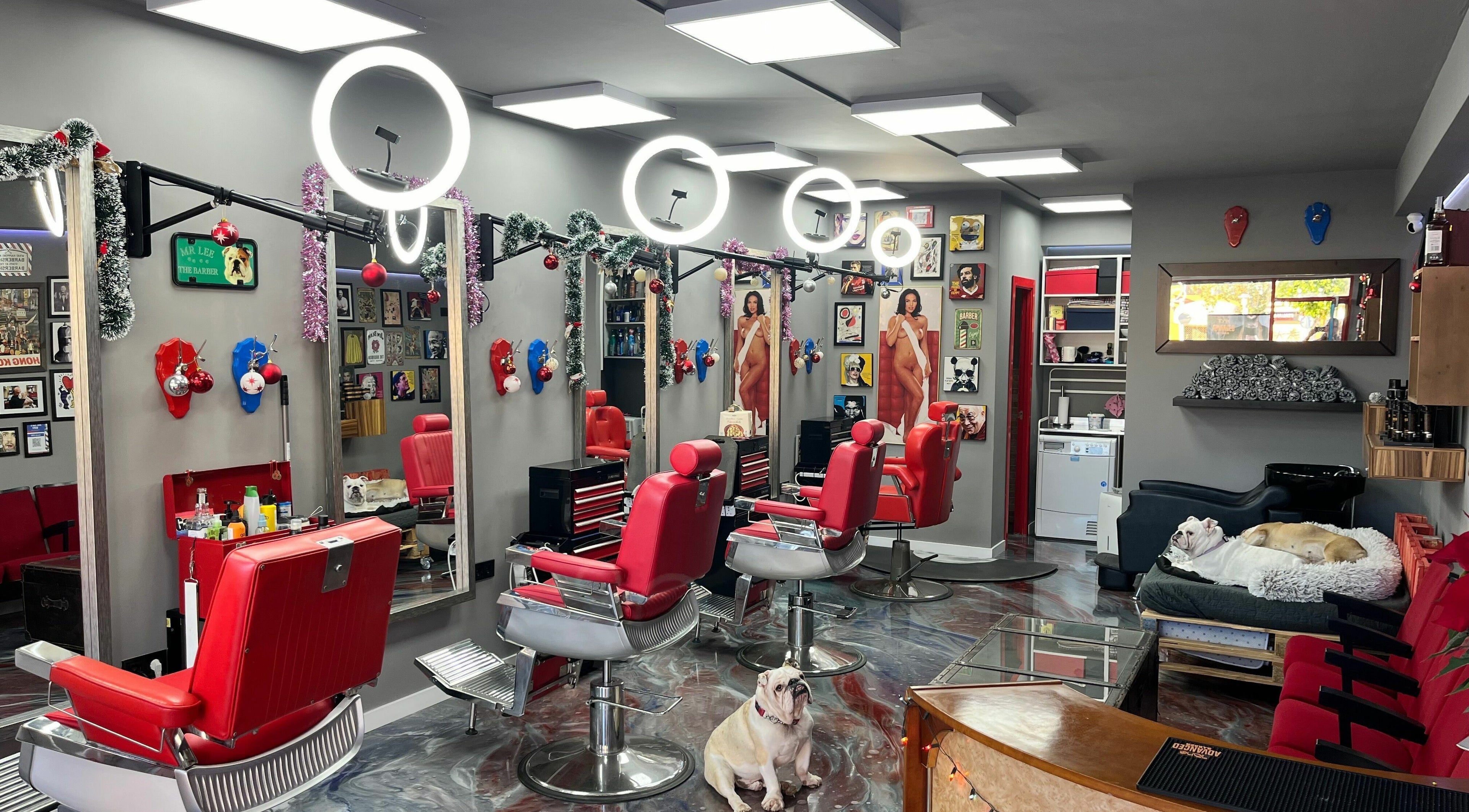 Inside Mr. Lee's Barbershop, Magaluf, Illes Balears, ES. Stylish chairs and decor.