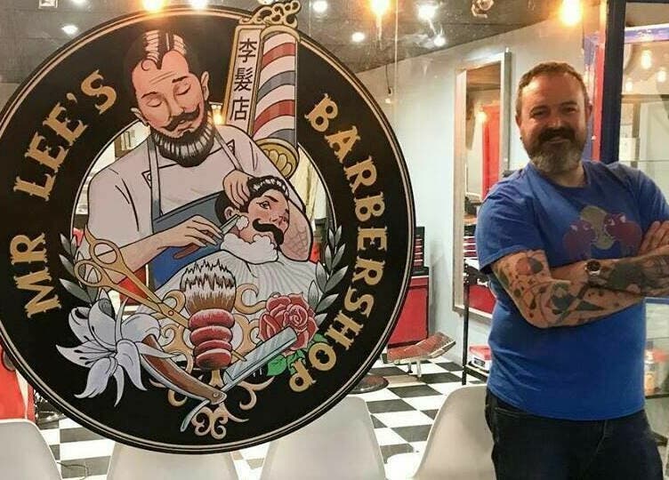 Mr. Lee's Barbershop logo and interior in Magaluf, Illes Balears, ES.