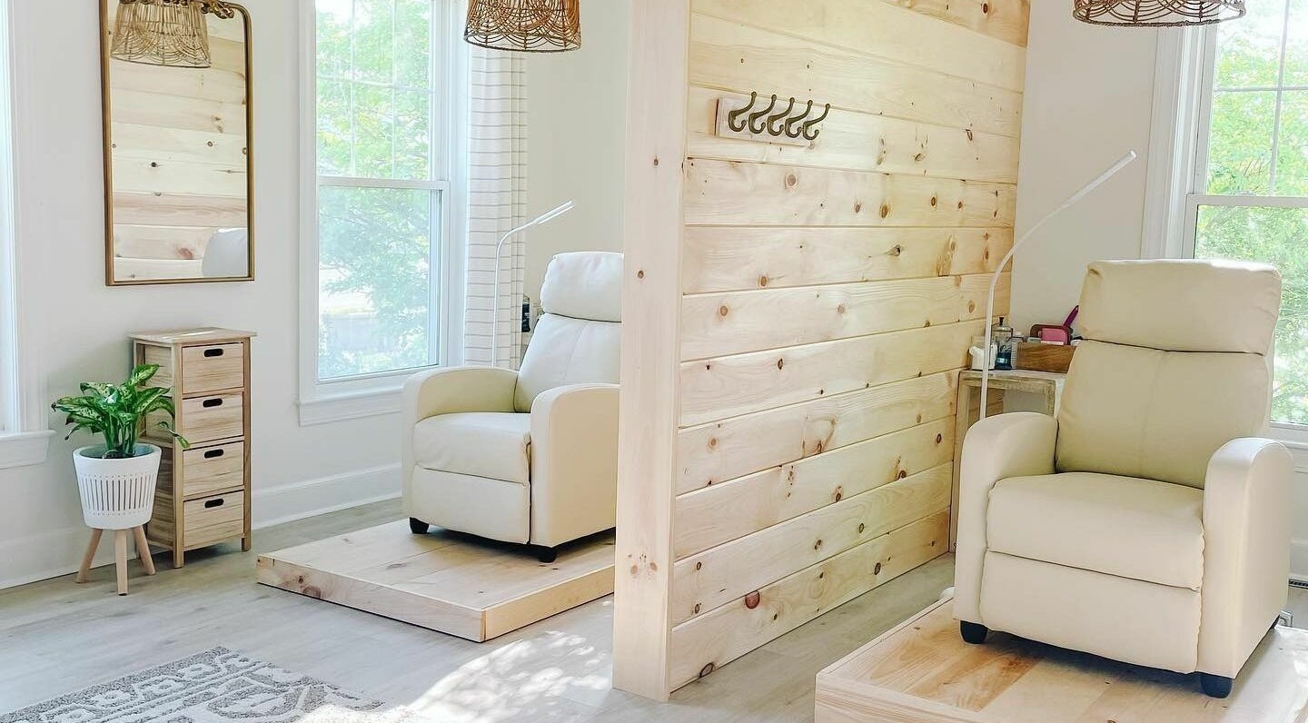 Relaxing seating area at Katie Aesthetic Nurse at Lashed+, Norwell, Massachusetts, US. Bright, cozy ambiance.