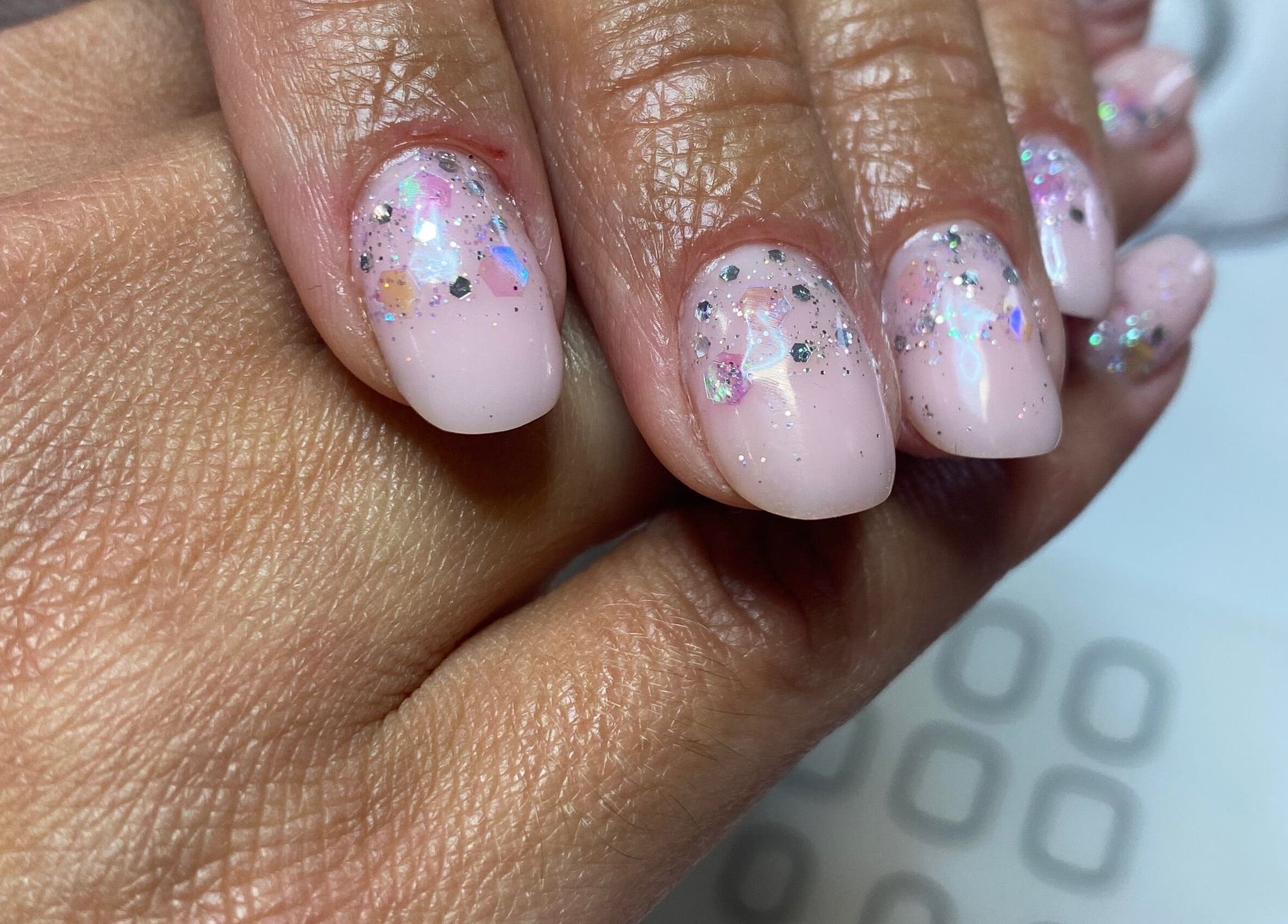 Sparkling nail art at Sky 4 Nails, Poole, England, GB showcasing a stunning finish.