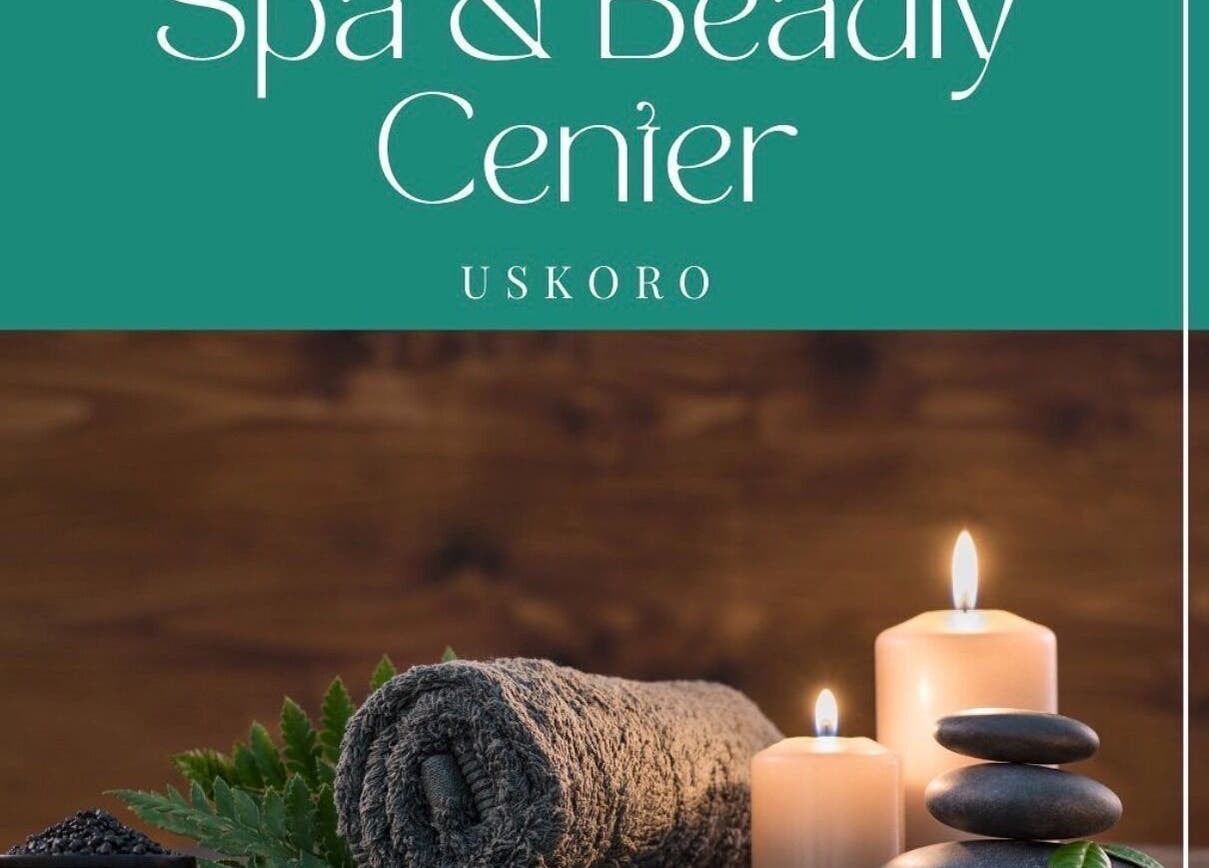 Cozy spa setup at Enjoy salona, Vogošća, Federacija Bosne I Hercegovine, BA with candles and towels.