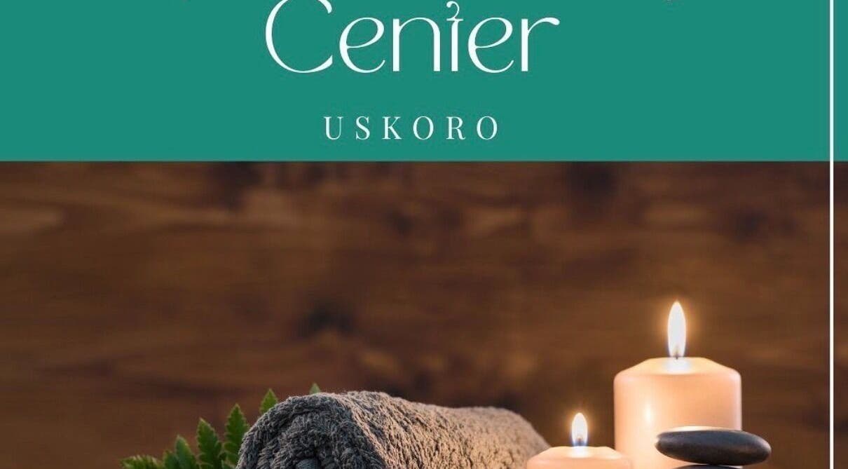 Cozy spa setup at Enjoy salona, Vogošća, Federacija Bosne I Hercegovine, BA with candles and towels.