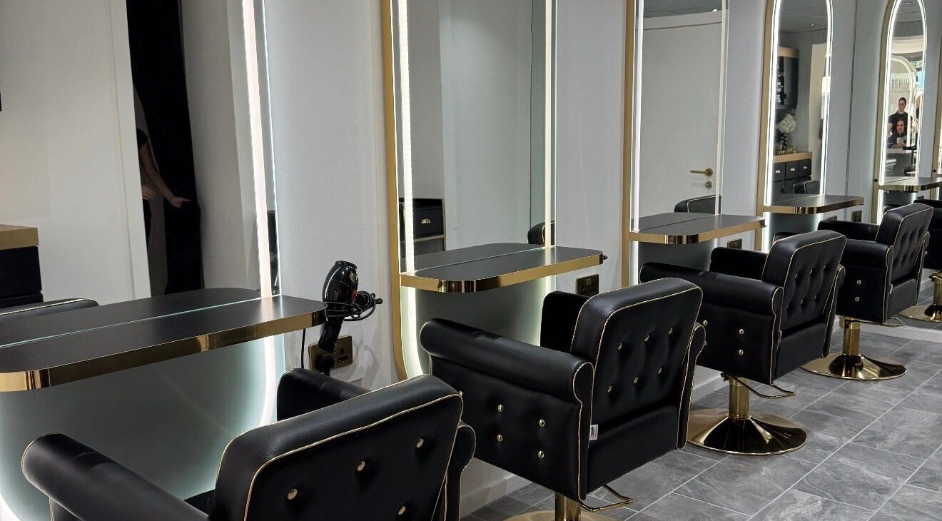 Elegant salon chairs and mirrors at The Salon Box, Brentwood, England, GB.