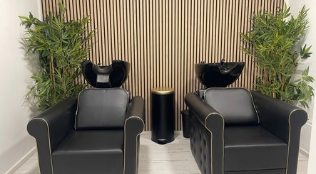 Sophisticated wash chairs at The Salon Box, Brentwood, England, GB showcase luxury and comfort.