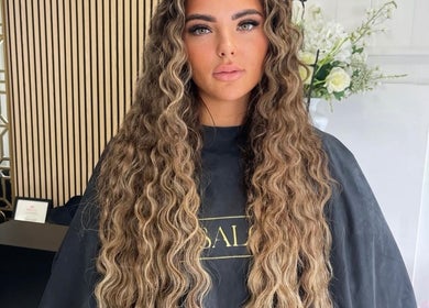 Elegant wavy hairstyle at The Salon Box in Brentwood, England, GB, showcasing expert hair styling.