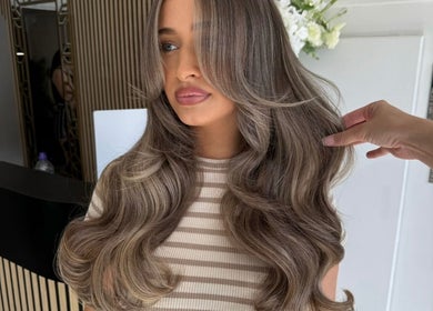 Stylish wavy hairstyle at The Salon Box, Brentwood, England, GB, showcasing expert hair design and finesse.