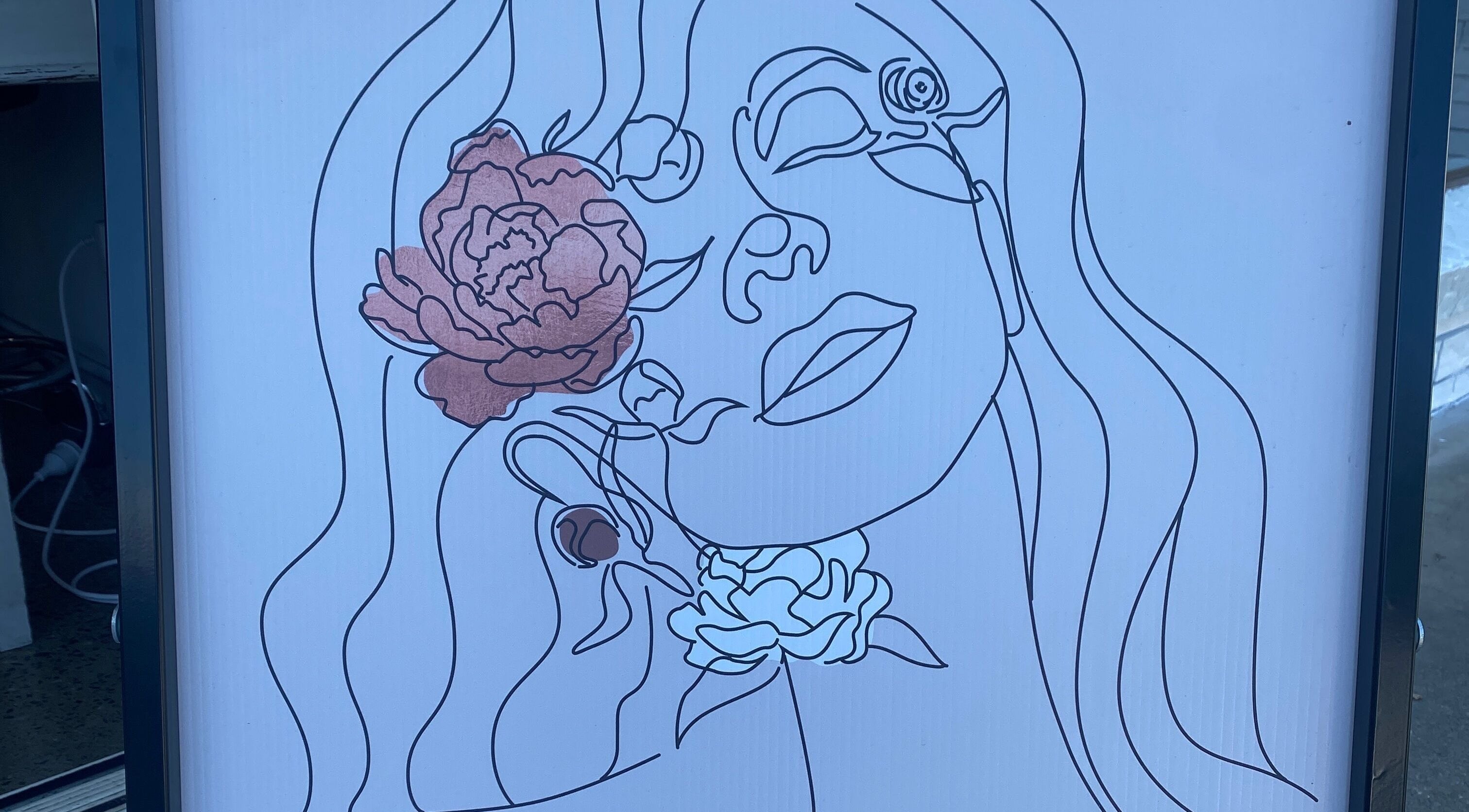 Artistic floral line drawing at Jo Bailey Style, CURRUMBIN WATERS, Australia, AU salon creates a serene ambiance.