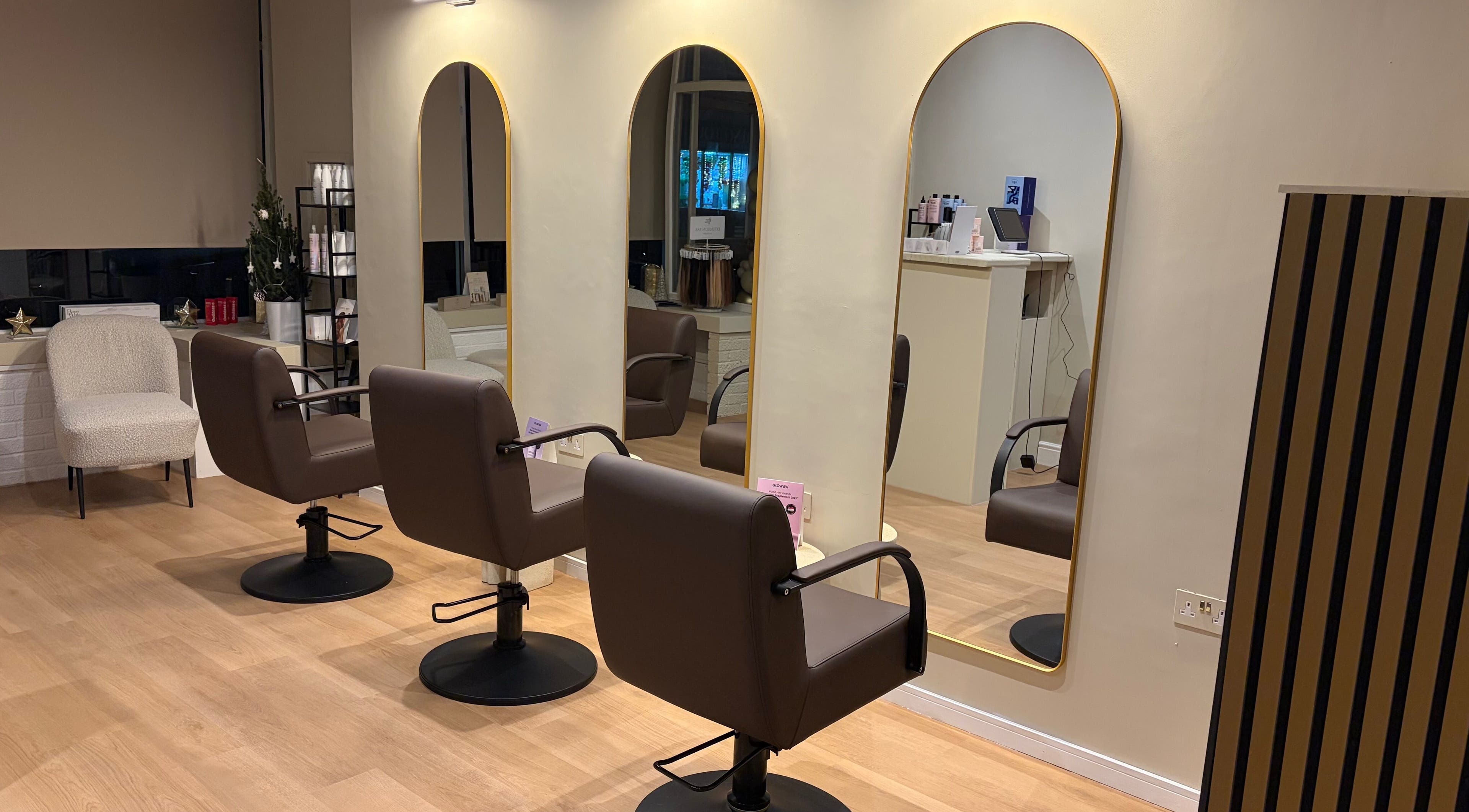 Elegant salon chairs and mirrors at Oh Lush Nails, Ystrad Mynach, Wales, GB.
