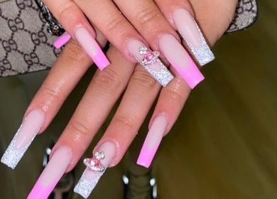 Elegant pink and glitter nails from Hacrylicz in Seaton Delaval, England, GB showcase exquisite nail artistry.