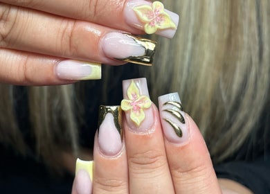 Intricate nail art with floral and gold designs by Hacrylicz in Seaton Delaval, England, GB.