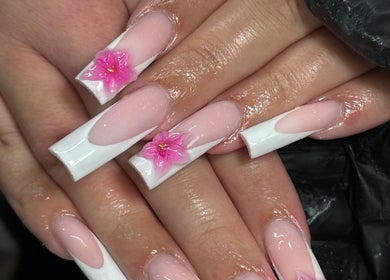 Intricate floral nail art by Hacrylicz at Seaton Delaval, England, GB showcasing delicate pink flowers.