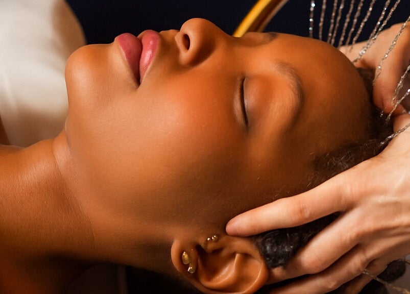 Relaxing head massage at Gigi Vi Ltd, Plymouth, England, GB. Experience rejuvenating wellness treatments.