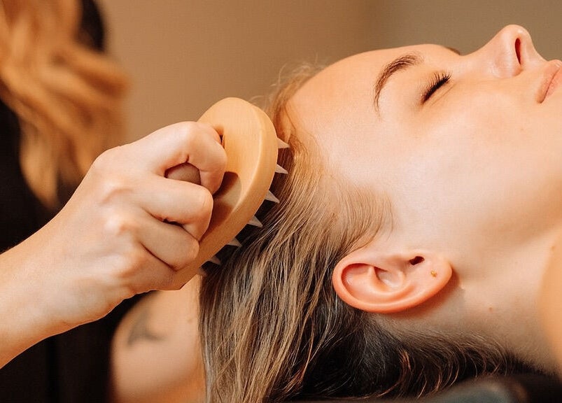 Scalp massage at Gigi Vi Ltd, Plymouth, England, GB. Enhance relaxation and wellness.