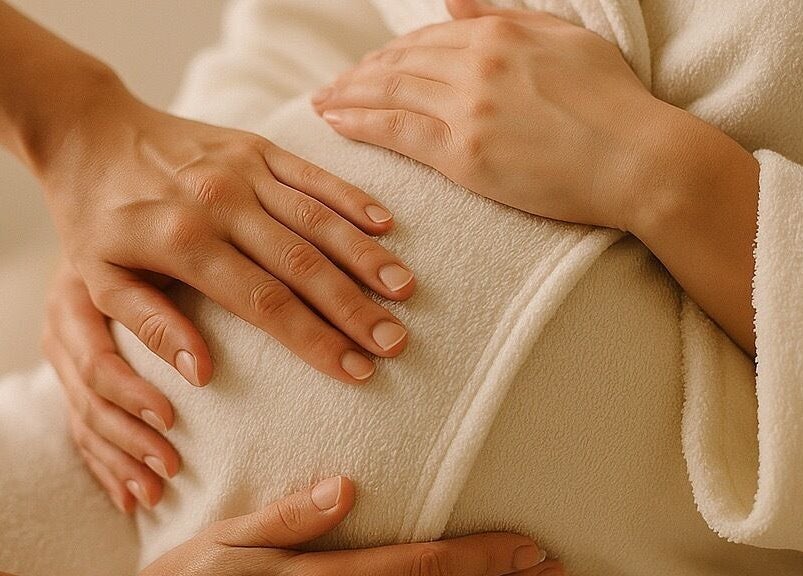 Calming spa massage at Gigi Vi Ltd in Plymouth, England, GB featuring nurturing hands in a serene setting.