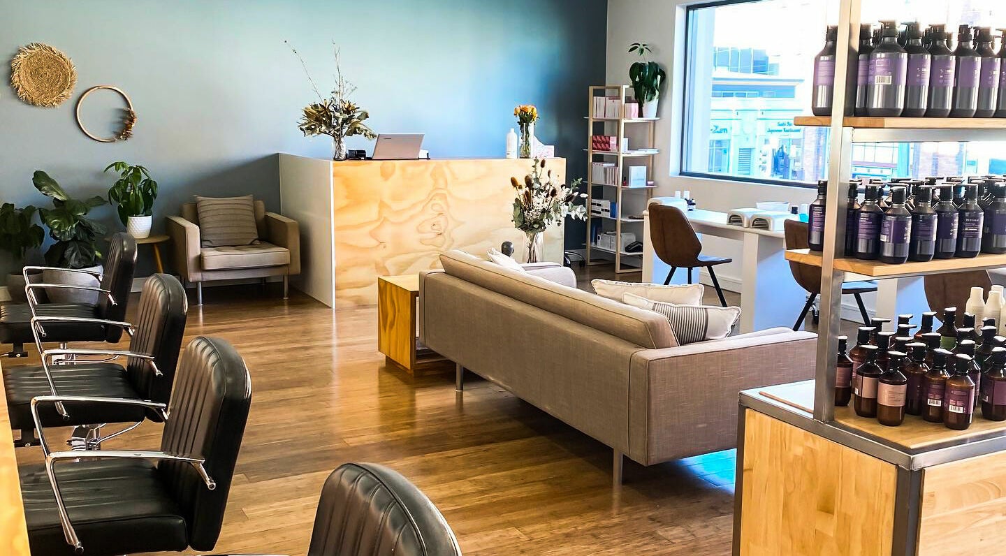 Inviting interior of Essence Skin and Body, Launceston, Tasmania, AU featuring modern decor and cozy seating.