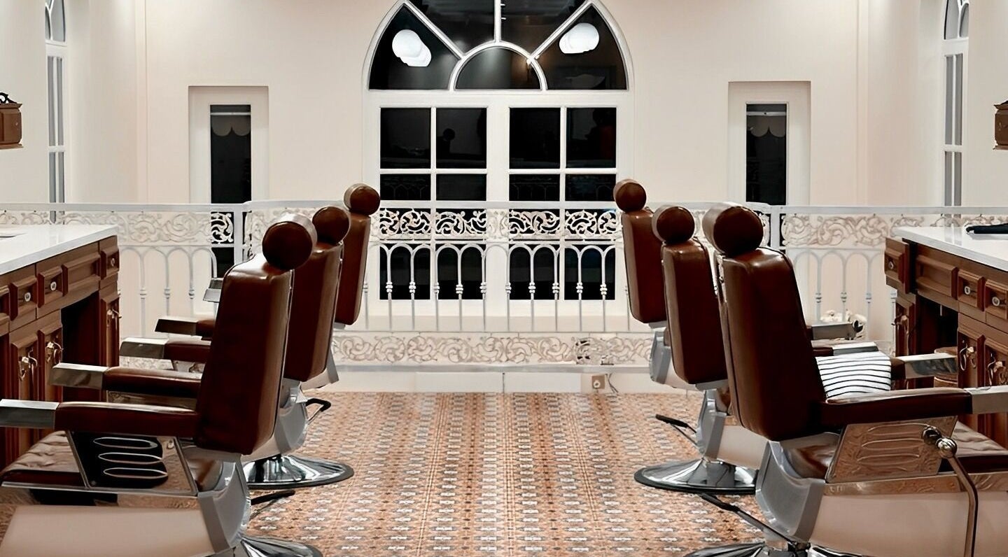 Luxurious interior of Fraser Barbershop - North Dagon, Yangon, Yangon Region, MM, featuring sleek barber chairs.