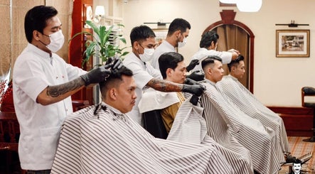 Fraser Barbershop - Botahtaung barbers styling hair in Yangon, Yangon Region, MM.