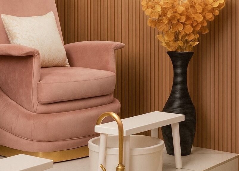 Luxurious pedicure chair at Nice Nails and Wellness in Johannesburg, Gauteng, ZA, featuring warm decor and modern design.