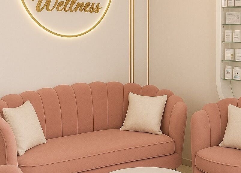 Elegant interior of Nice Nails and Wellness, Johannesburg, Gauteng, ZA, featuring plush peach seating and a soothing ambiance.