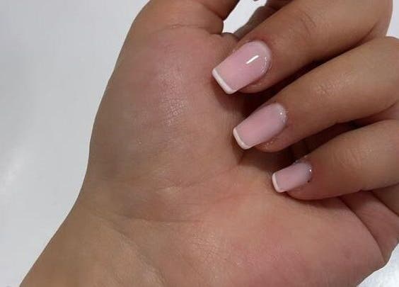 Elegant French manicure at Nice Nails and Wellness, Johannesburg, Gauteng, ZA. Perfectly polished nails.