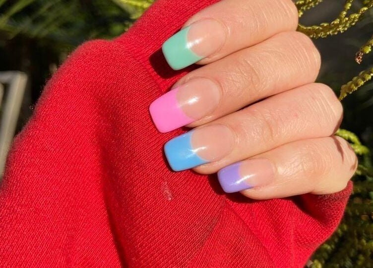 Colorful manicured nails from Nice Nails and Wellness in Johannesburg, Gauteng, ZA.