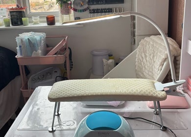 Cozy nail care setup at Gemmy Gorgeous, Leeds, England, GB, with tools and comfortable seating.