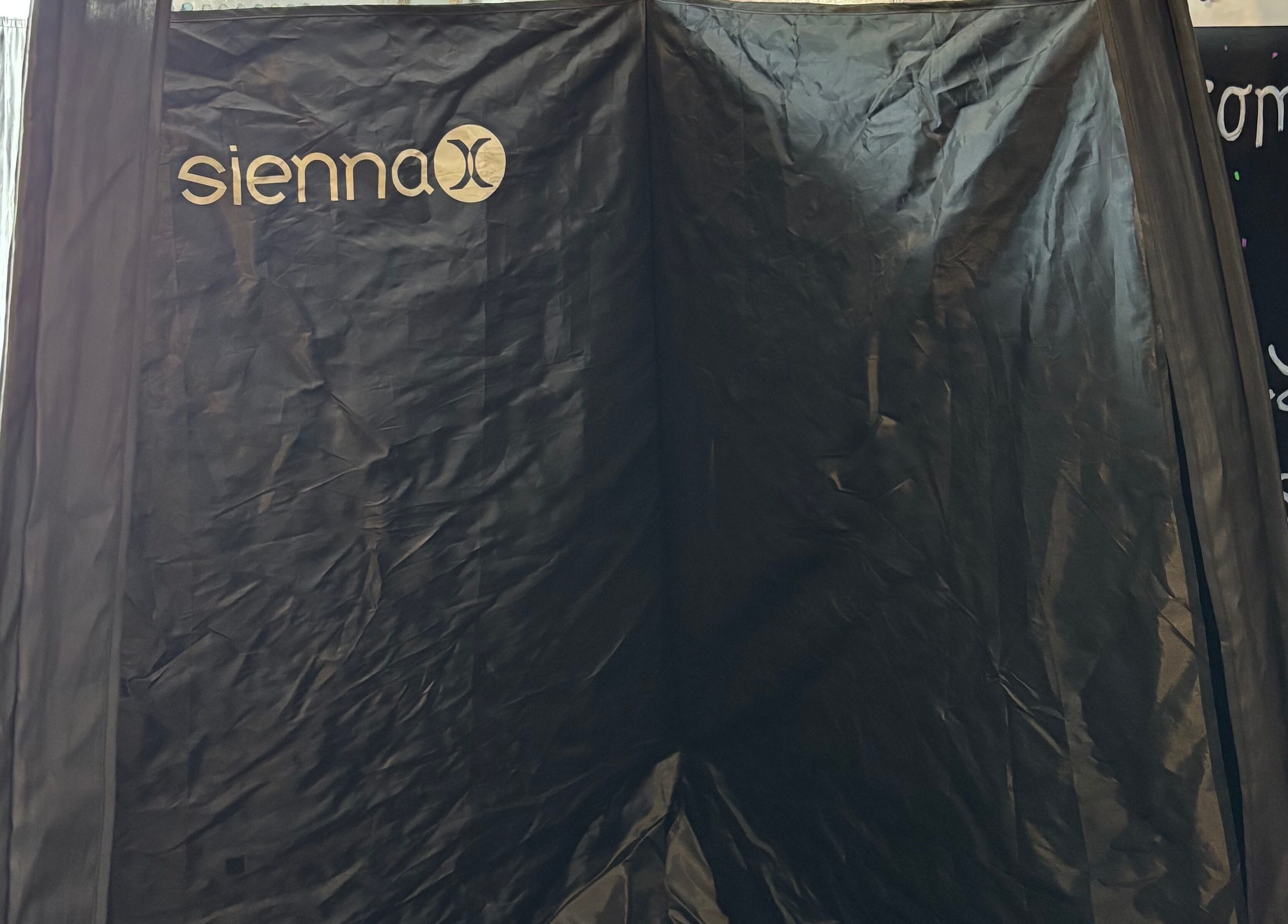 SiennaX tanning tent at Gemmy Gorgeous, Leeds, England, GB, offering professional spray tanning services.
