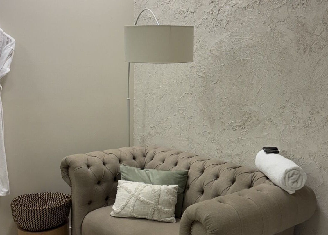 Cozy seating area with robe at Canberra Day Spa, Canberra, Australian Capital Territory, AU.