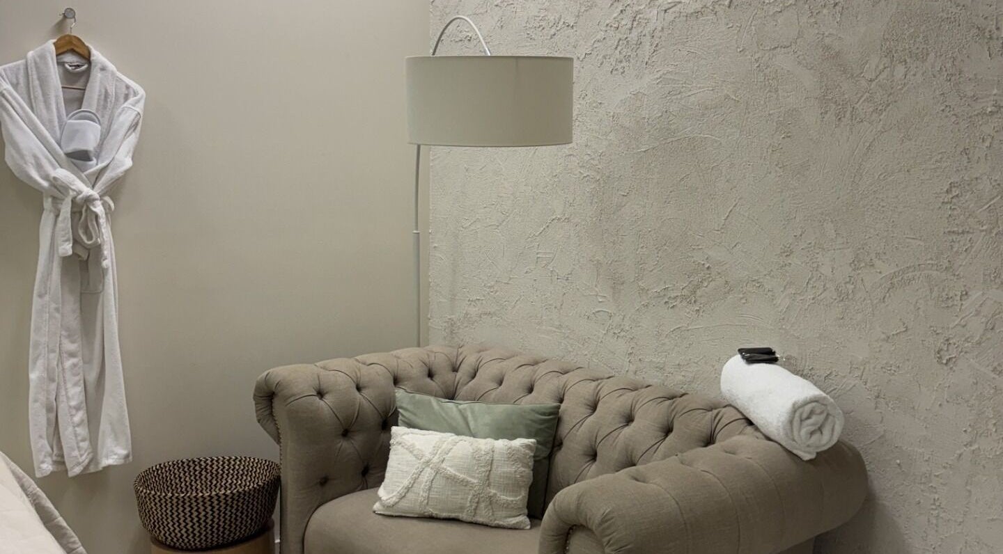 Cozy seating area with robe at Canberra Day Spa, Canberra, Australian Capital Territory, AU.