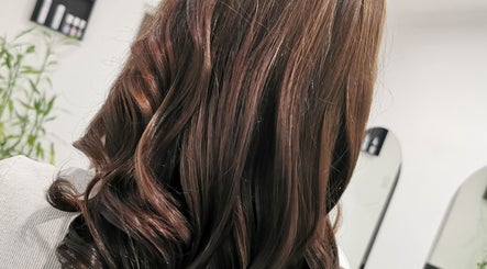 Shiny brunette curls styled at The Covered Pearl, Cape Town, Western Cape, ZA.