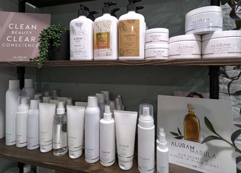 Aluram products displayed on a shelf at So.Kal.Hair, West Kelowna, British Columbia, CA.