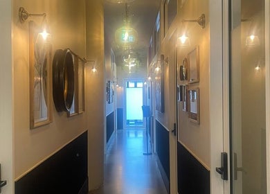 Sophisticated hallway at Love Your Skin by DK - Moonee Ponds in Melbourne, Victoria, AU with elegant decor.