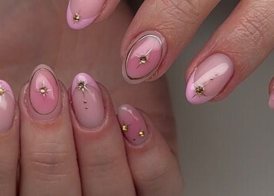 Elegant pink nail art with gold accents at Mani by Jay in London, England, GB.