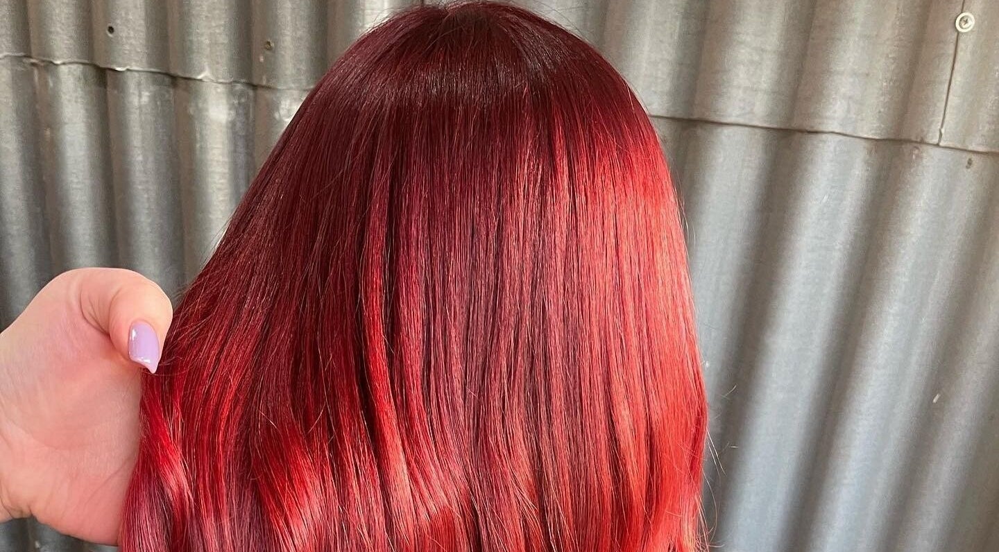 Stunning red hair makeover at Hair by Daisy, Polesworth, England, GB, showcasing vibrant, sleek styling.