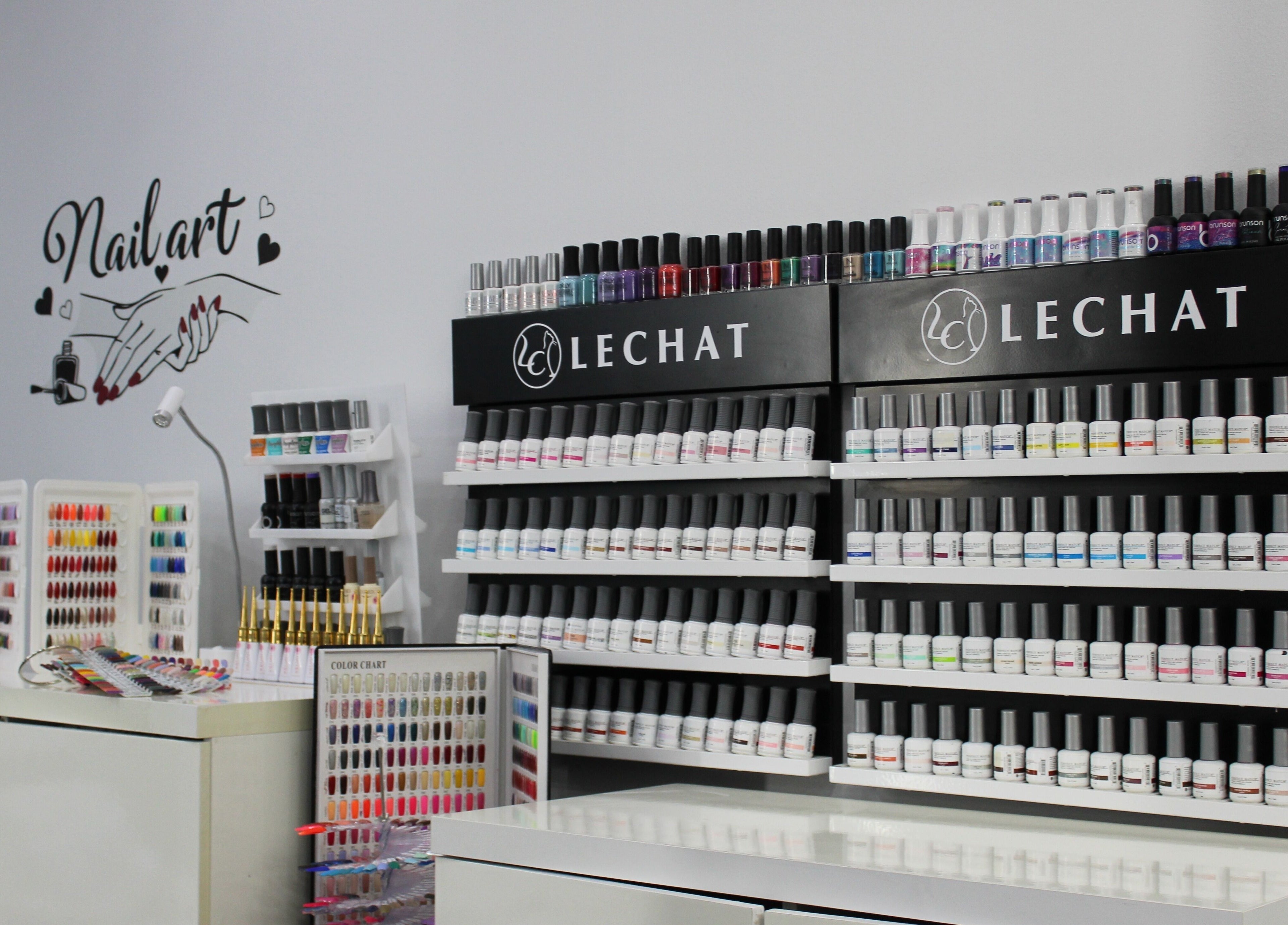 Nail polish collection at Nail Candy, Dubai, Dubai, AE showcases diverse shades and styles.
