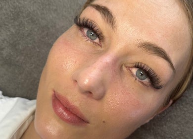 Close-up of a woman's face with perfect eyelash extensions at Callan J Artistry, Cape Town, Western Cape, ZA.