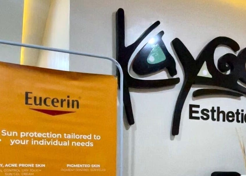 Entrance to Kayge Esthetics in Port Harcourt, Rivers, NG, featuring Eucerin product display.