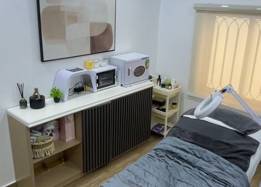 Cozy treatment room at Kayge Esthetics, Port Harcourt, Rivers, NG with a massage bed and modern decor.
