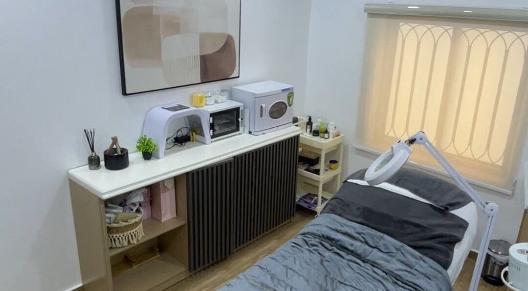 Cozy treatment room at Kayge Esthetics, Port Harcourt, Rivers, NG with a massage bed and modern decor.