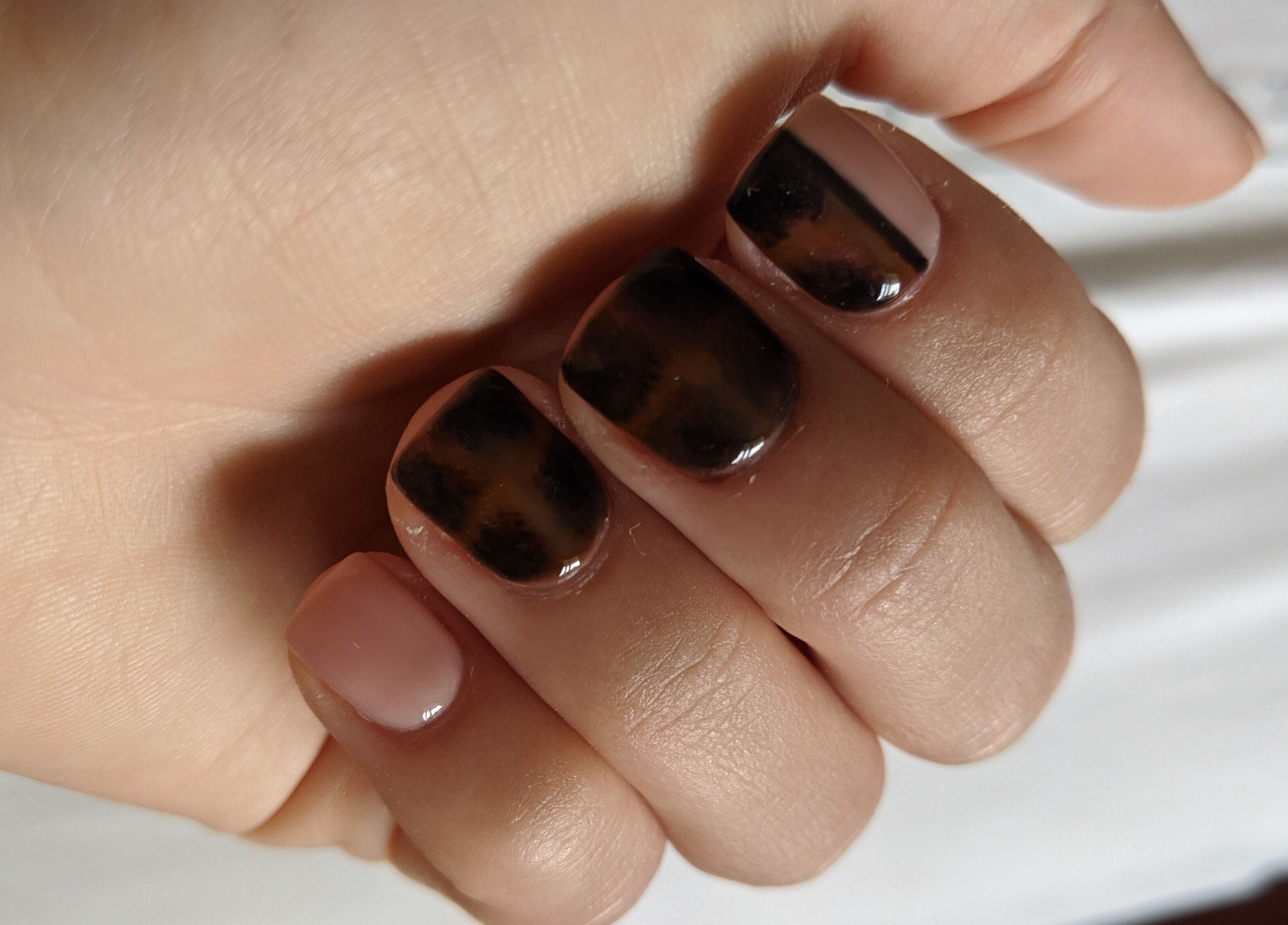 Tortoiseshell nails at Beauty in the Woods, Radlett, England, GB, showcase artistry and elegance.