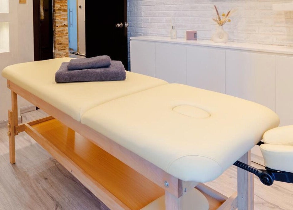Luxurious massage table at Effect Spa in Dubai, Dubai, AE, ready for relaxation and wellness.