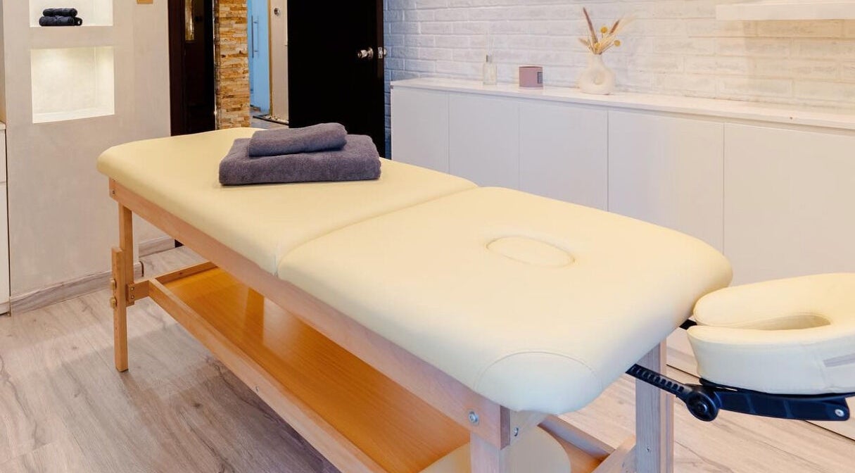 Luxurious massage table at Effect Spa in Dubai, Dubai, AE, ready for relaxation and wellness.