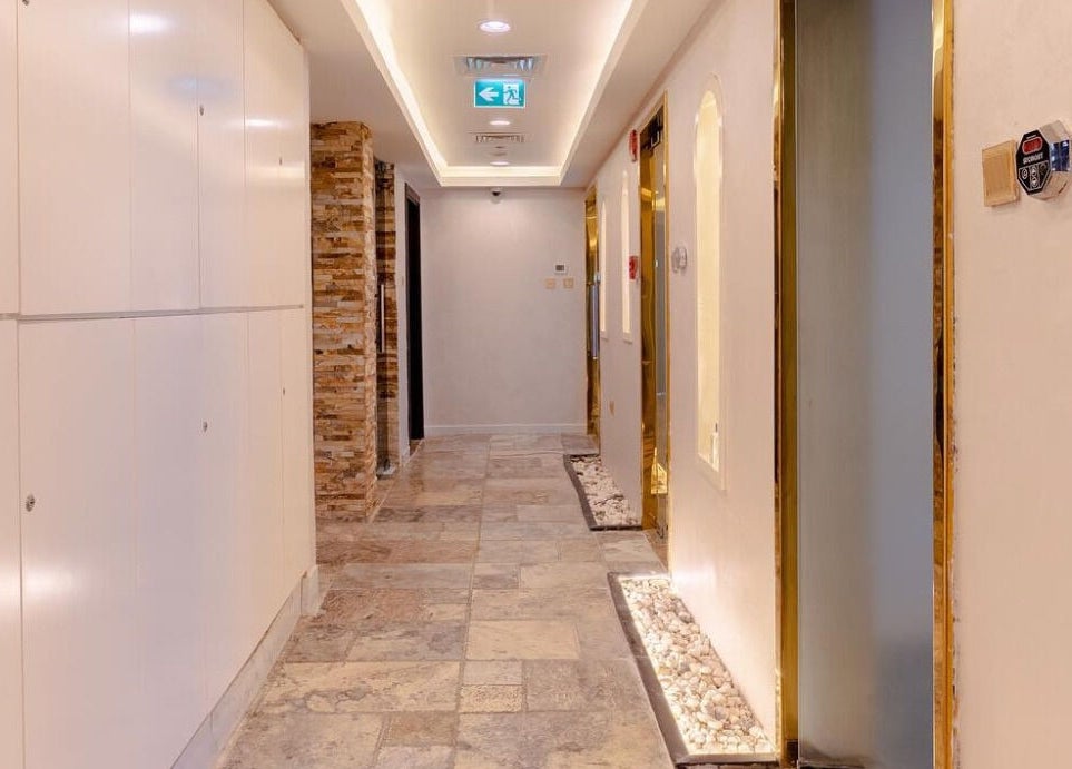 Elegant hallway at Effect Spa in Dubai, Dubai, AE with modern design and ambient lighting.