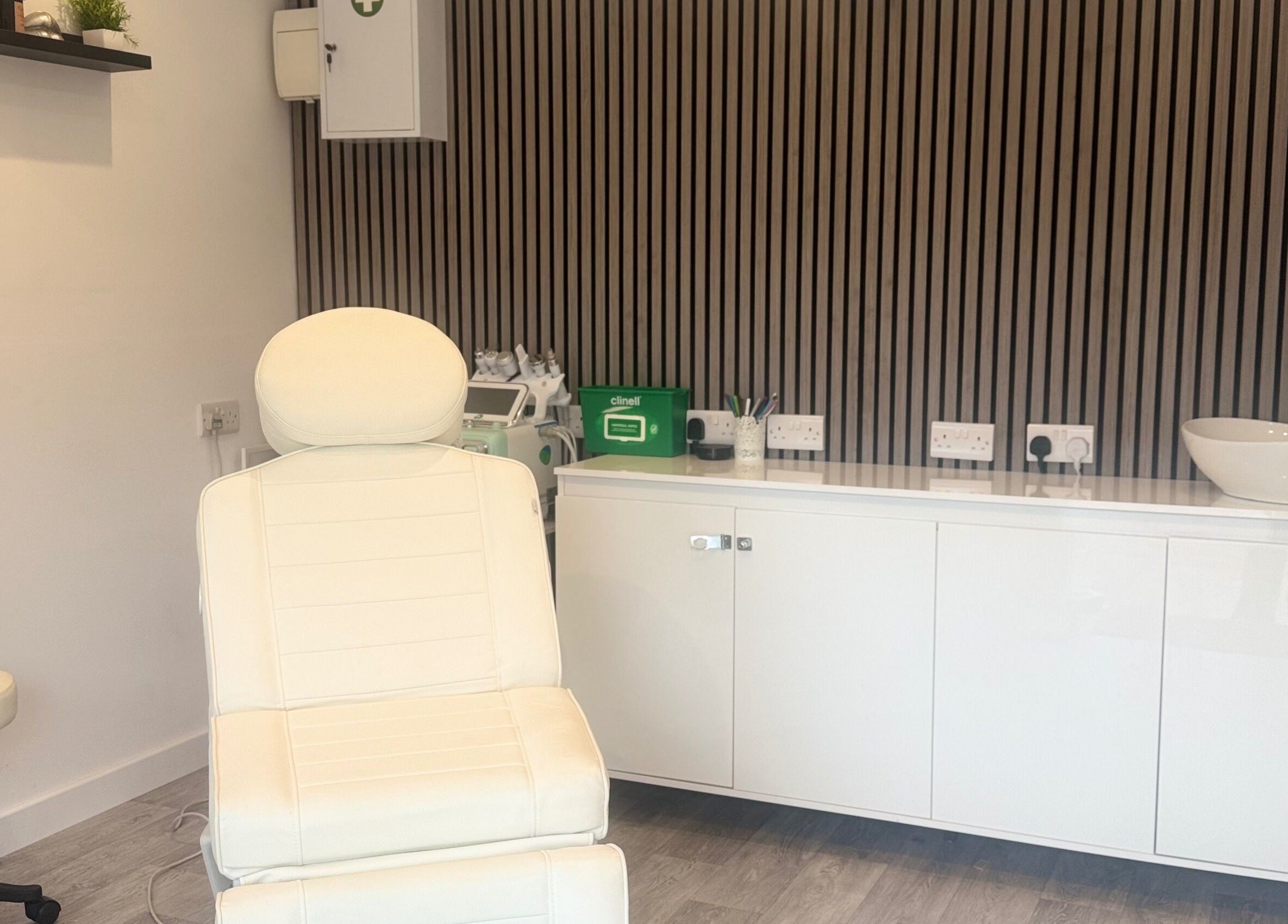 Modern treatment room at Hair and Aesthetics by Sophie in Marlow, England, GB, with sleek decor and comfortable chair.